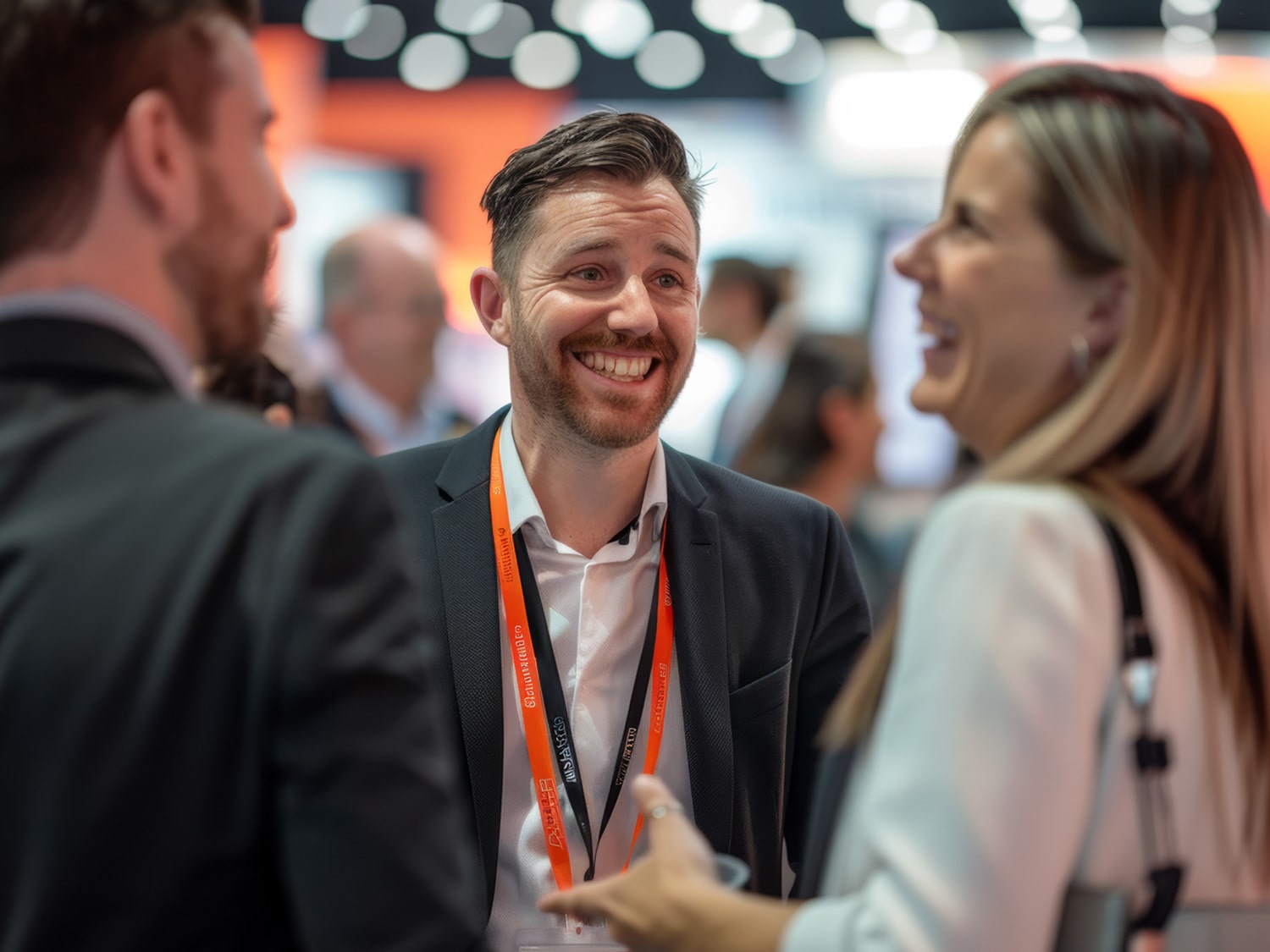 An image of business officials speaking with each other.