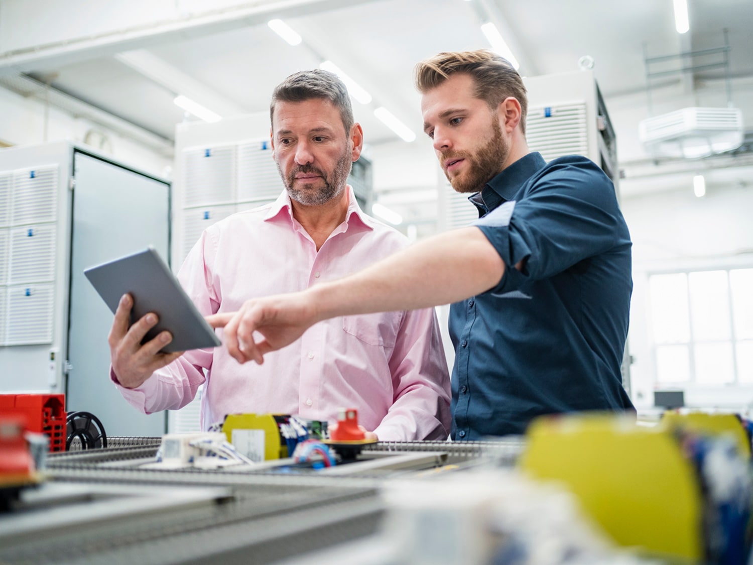 An image of two engineers working on a project.
